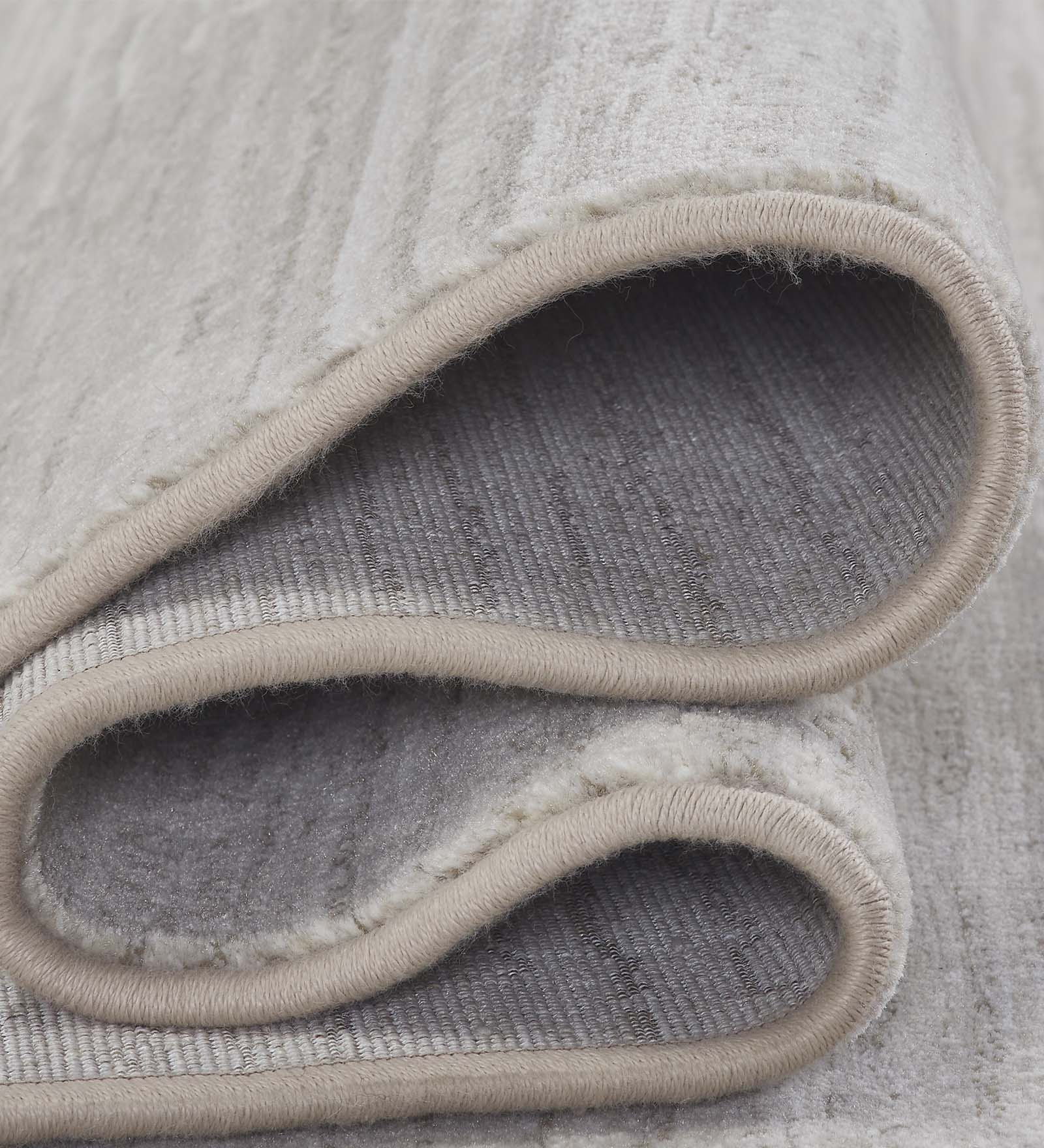 Aquarius Solid Machine Made Carpet Beige