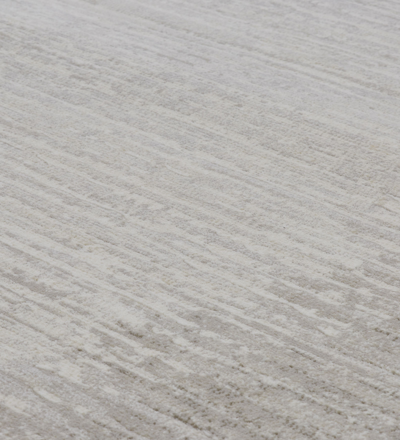 Aquarius Solid Machine Made Carpet Beige