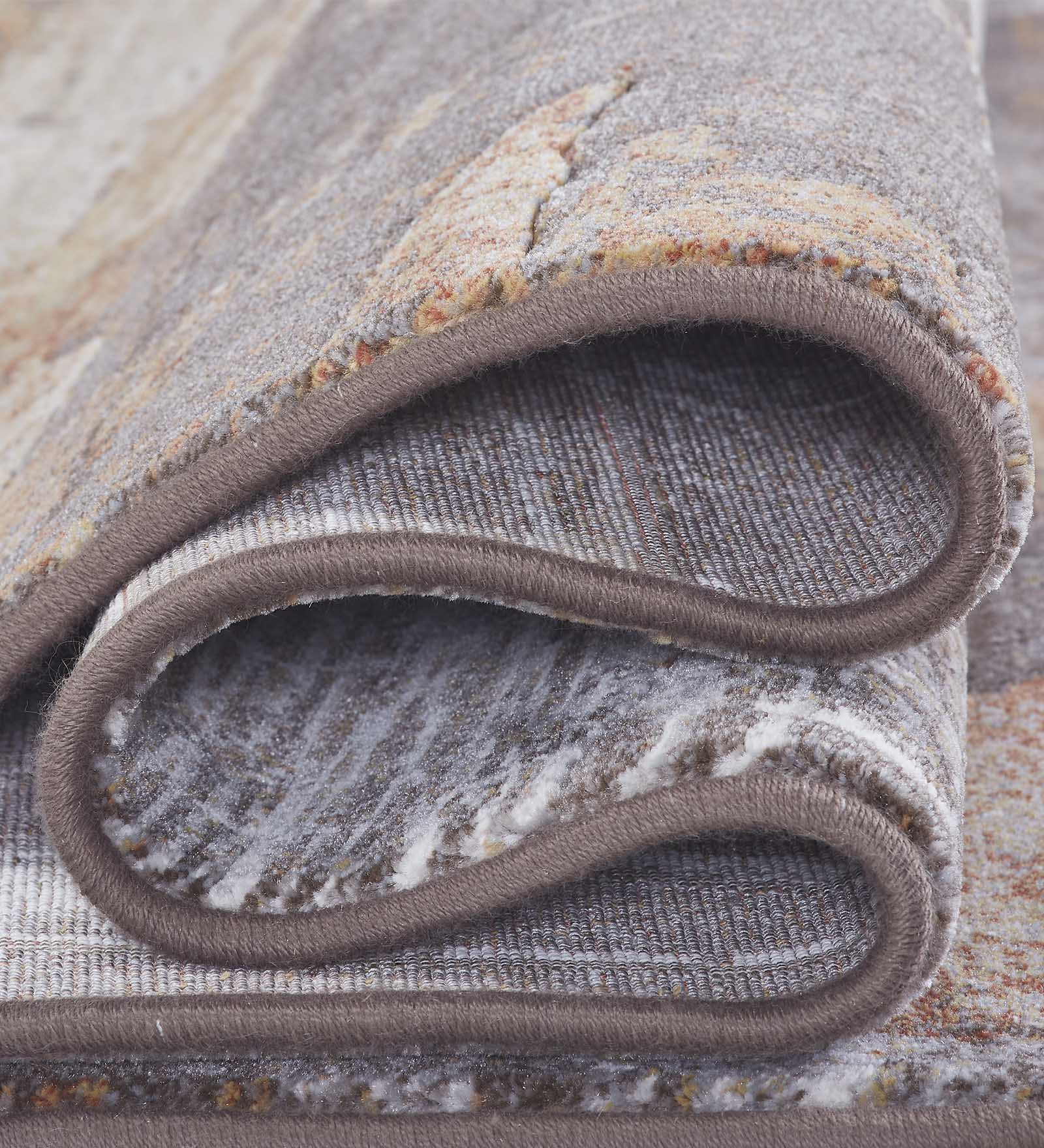 Aquarius Abstract Machine Made Carpet Cream and Rust