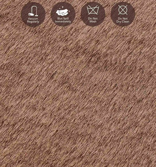 Angola 2 Solid Oval Shaped Carpet Brown