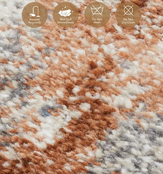 Cyrus Abstract Machine Made Carpet Orange
